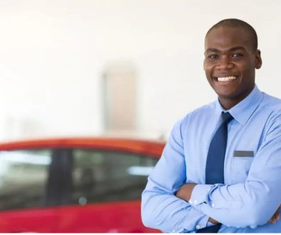 Young new car salesmen hired at a car dealership